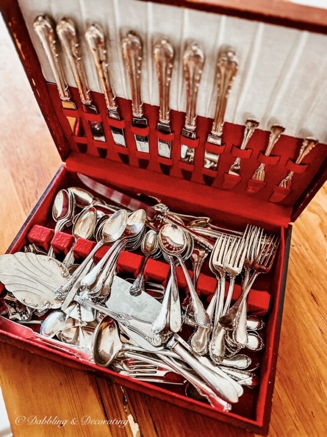 red box with vintage silverware