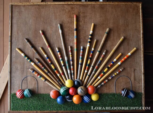 croquet art with balls and faux grass