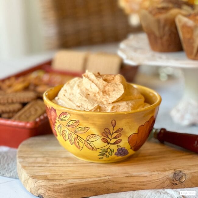 gold fall bowl with Pumpkin Fluff on bread board