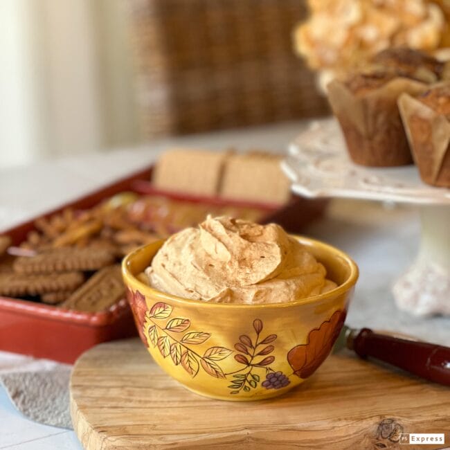 closet up of fall bowl with Pumpkin Fluff inside and dippers in the background