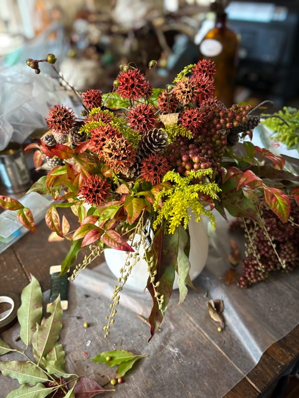 foraged balls and stems to make a beautiful floral arrangement