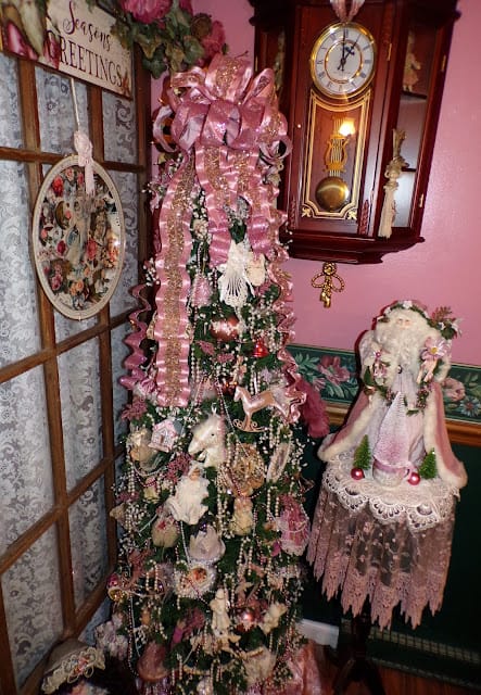 pink Victorian Christmas tree and Santa on side table