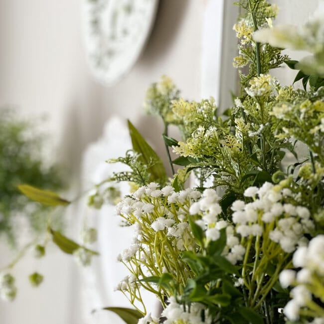 close up of green and white floral stems