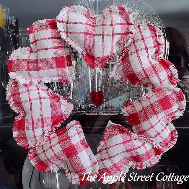 wreath made of red and white plaid fabric hearts