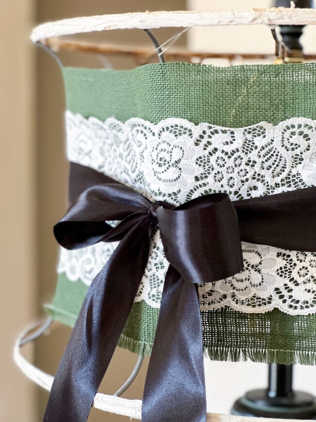 close up of the 3 layered fabrics and ribbon on vintage lampshade frame