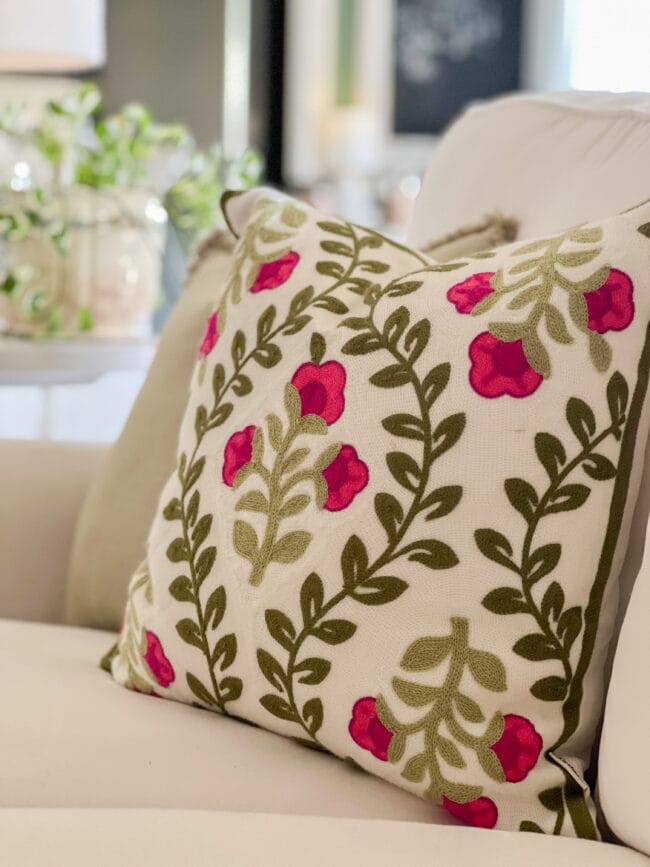 pink and green floral pillow